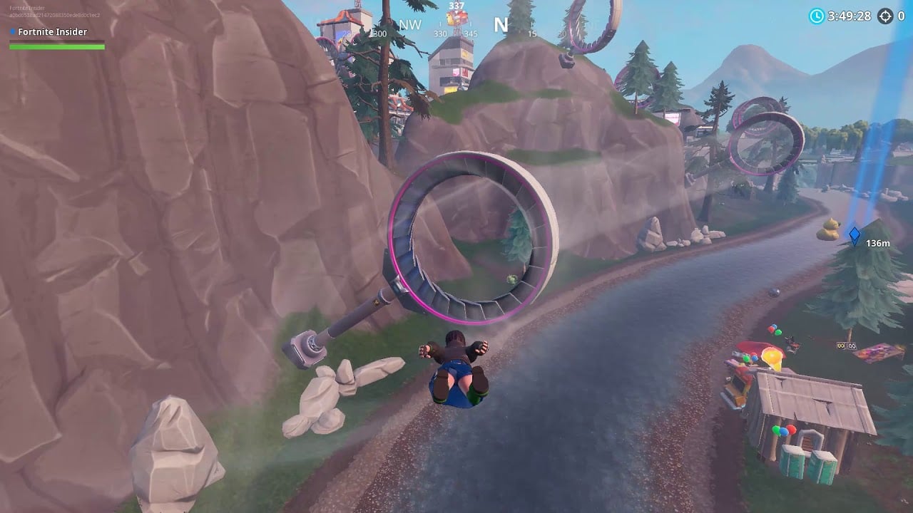 Huge Rubber Ducky Location - Visit a giant beach umbrella and a huge rubber ducky in a single match